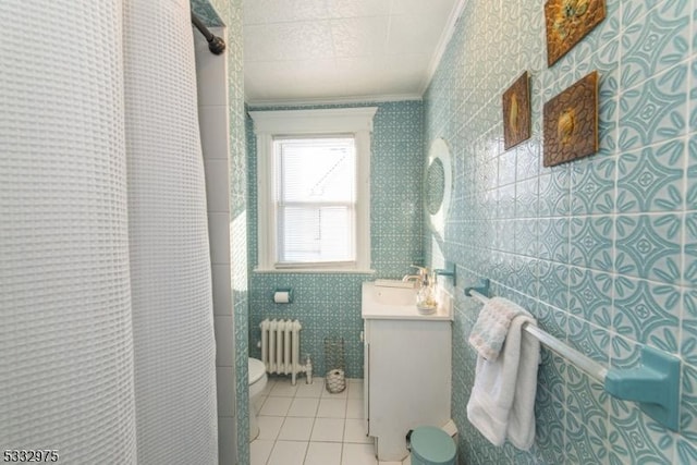 bathroom featuring radiator, tile patterned flooring, vanity, ornamental molding, and a shower with curtain