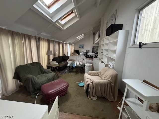 interior space with lofted ceiling with skylight