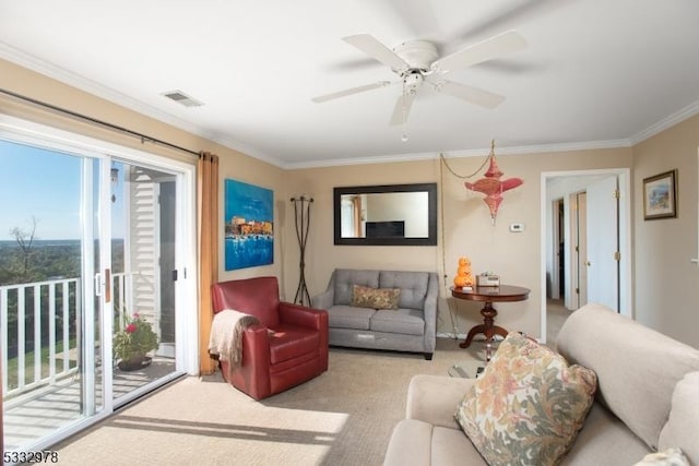 living room with light carpet, ceiling fan, and crown molding