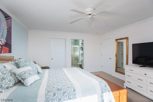 bedroom with ceiling fan, ornamental molding, and ensuite bath