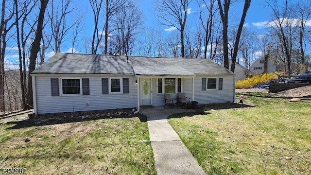 view of front of home with a front yard