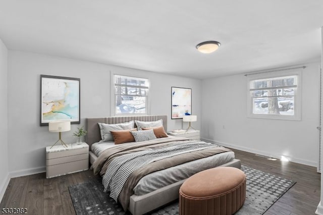 bedroom featuring dark hardwood / wood-style floors