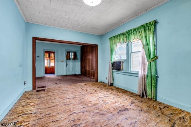 empty room with carpet floors and cooling unit