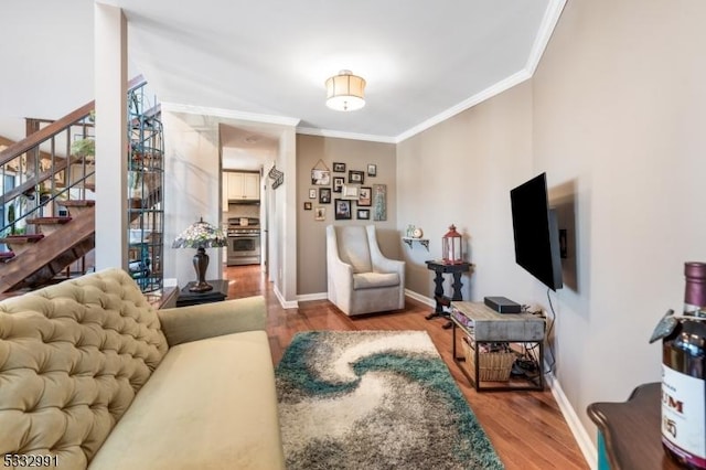 living room featuring ornamental molding and wood-type flooring