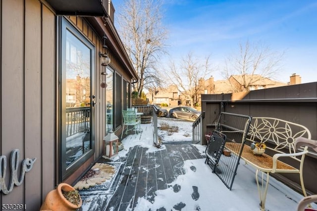 view of snow covered deck