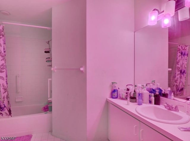 bathroom featuring tile patterned flooring, shower / tub combo with curtain, and vanity