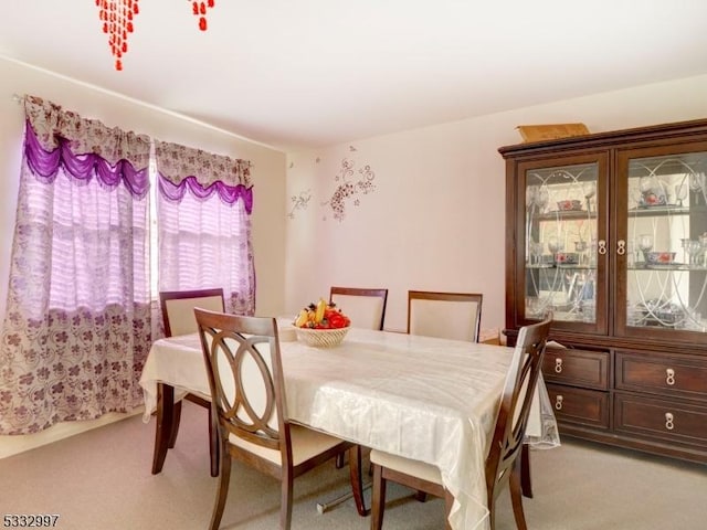 view of carpeted dining room