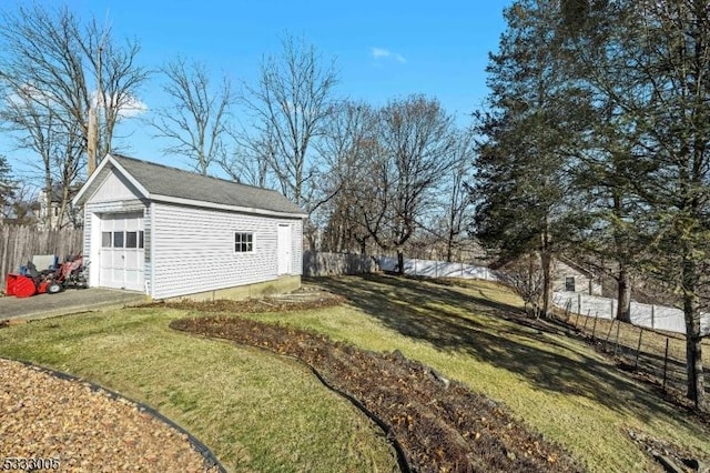 garage with a yard