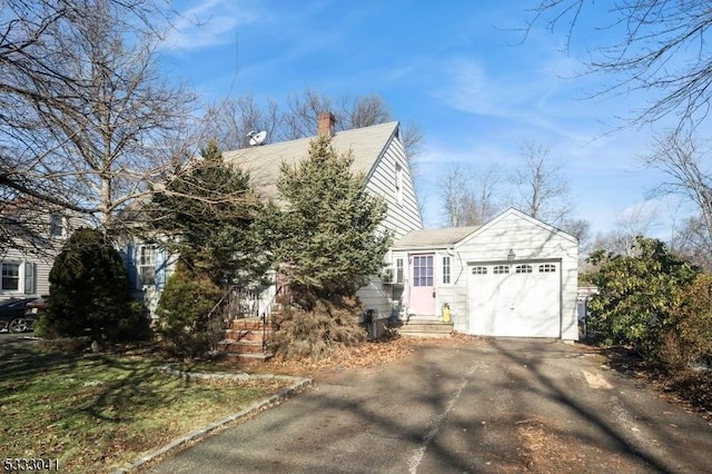 view of property exterior with a garage