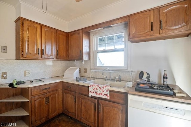 kitchen with ornamental molding, dishwasher, decorative backsplash, and sink