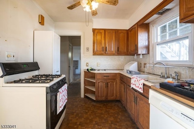 kitchen featuring white appliances, ceiling fan, decorative backsplash, dark parquet flooring, and sink