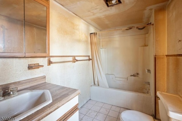 full bathroom featuring shower / tub combo, tile patterned flooring, vanity, and toilet