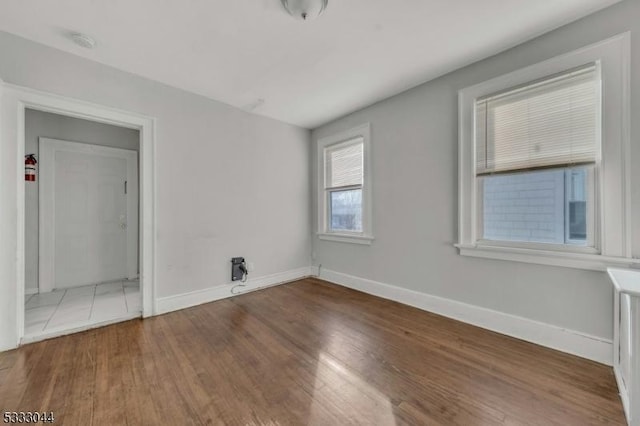 empty room featuring hardwood / wood-style floors