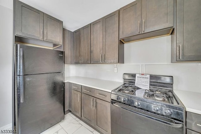 kitchen with dark brown cabinetry and black appliances