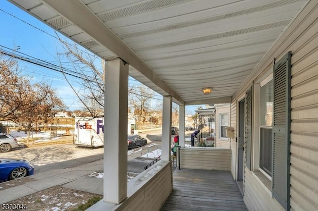 wooden deck featuring a porch