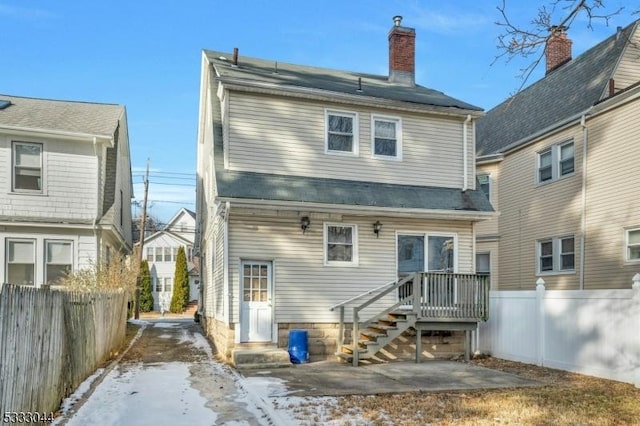 rear view of house with a patio