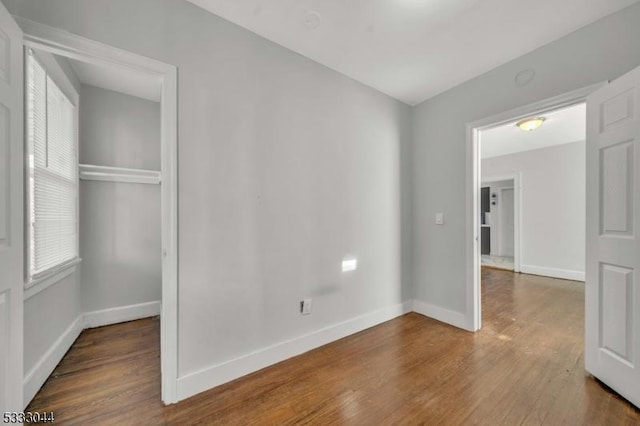 empty room featuring hardwood / wood-style floors