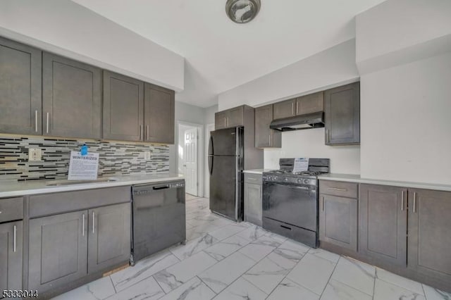 kitchen with backsplash and black appliances