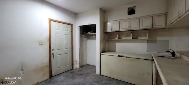 kitchen with refrigerator and sink