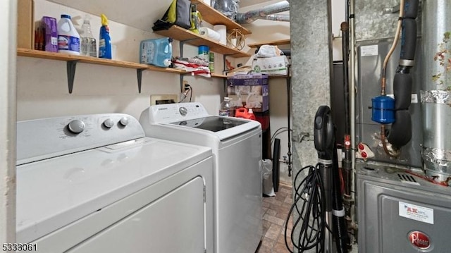 washroom featuring washer and dryer