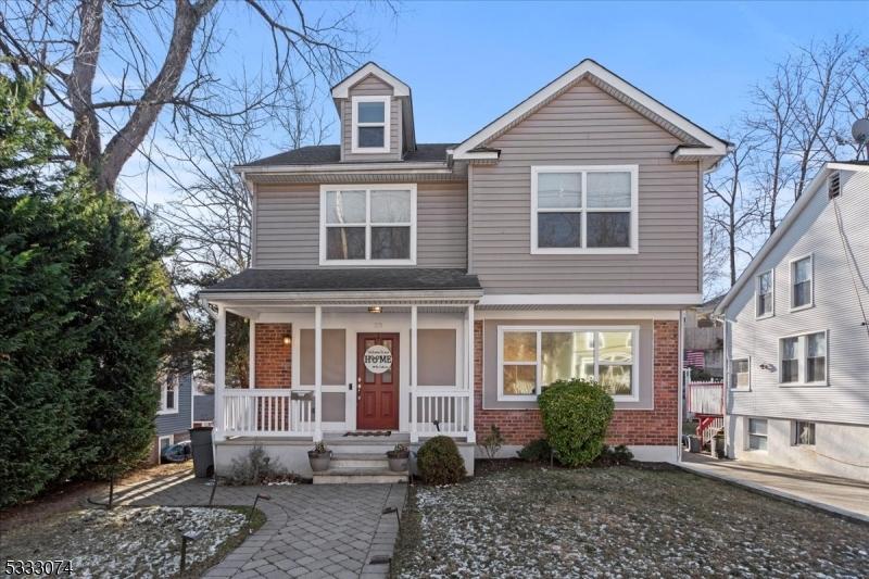 view of property with covered porch