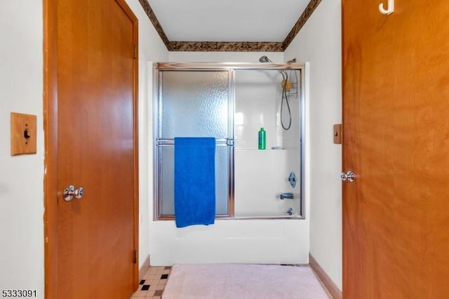 bathroom featuring enclosed tub / shower combo