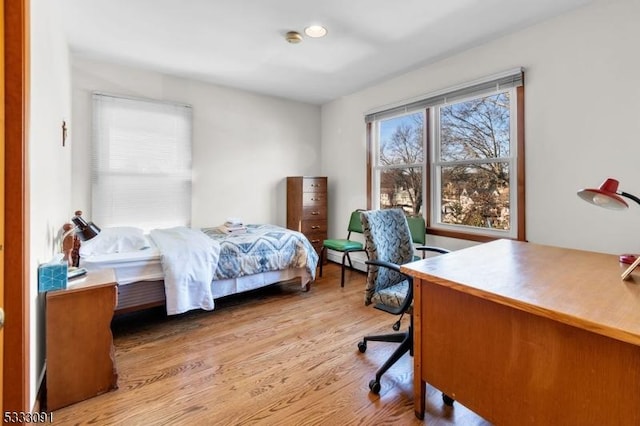 bedroom featuring light wood-type flooring