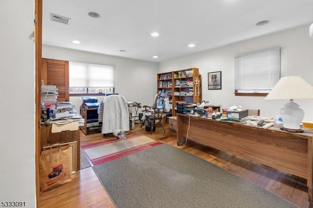 office with light hardwood / wood-style floors