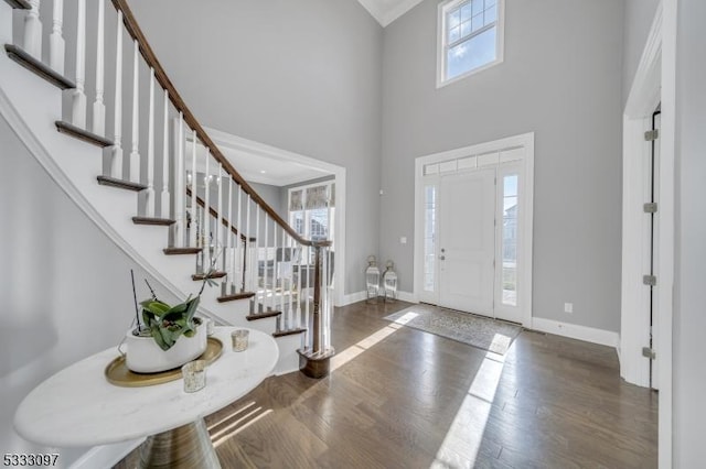 foyer entrance featuring a high ceiling