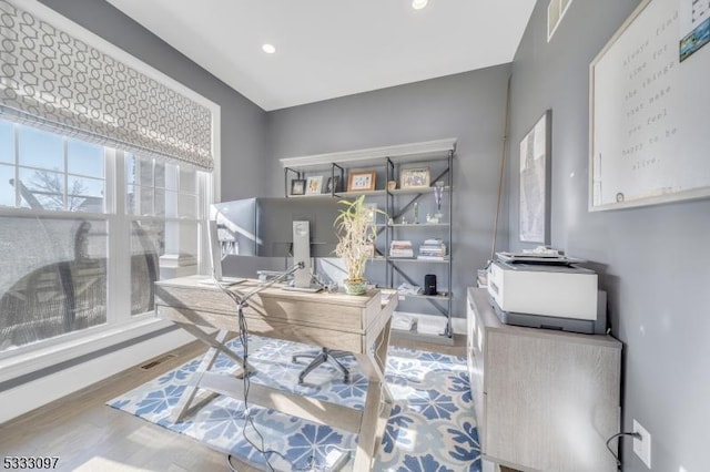 office area with hardwood / wood-style flooring