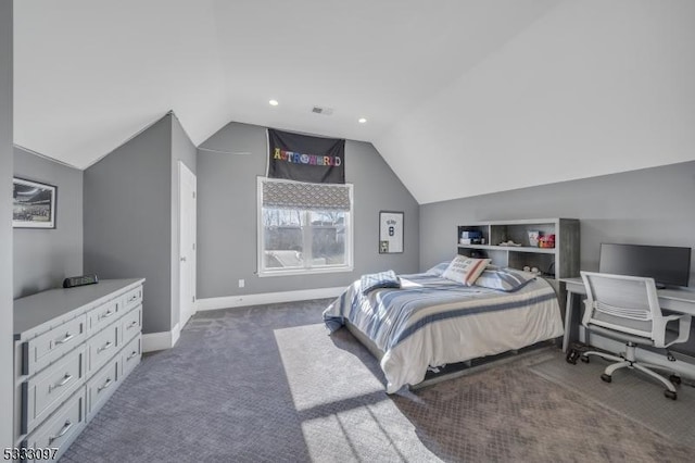 bedroom featuring dark colored carpet and lofted ceiling