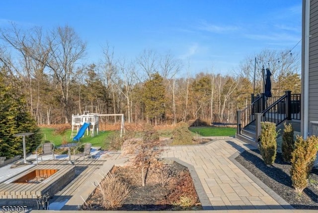 view of patio with a playground