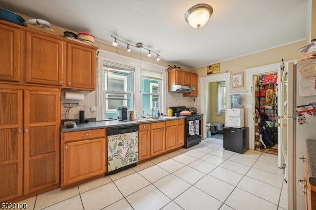 kitchen featuring light tile patterned floors, sink, dishwasher, black range with electric stovetop, and white refrigerator