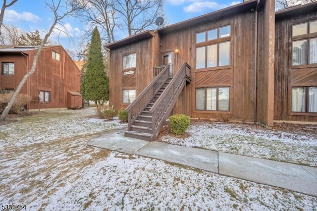 view of snow covered house