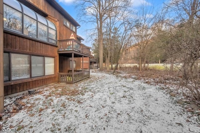 view of yard layered in snow