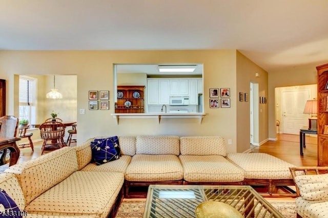 living room with light hardwood / wood-style floors