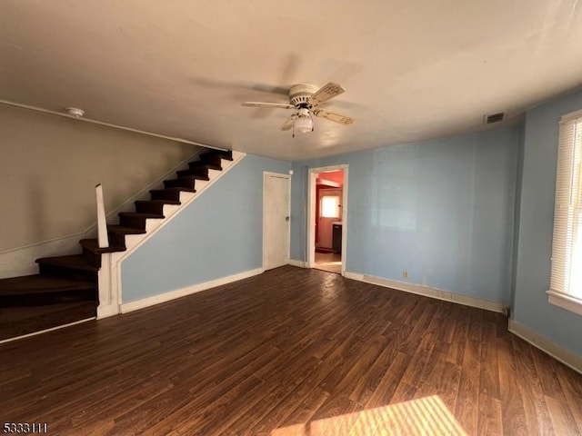 spare room featuring hardwood / wood-style flooring and ceiling fan