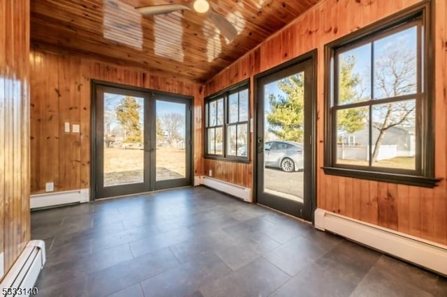 entryway featuring wood ceiling and a baseboard radiator