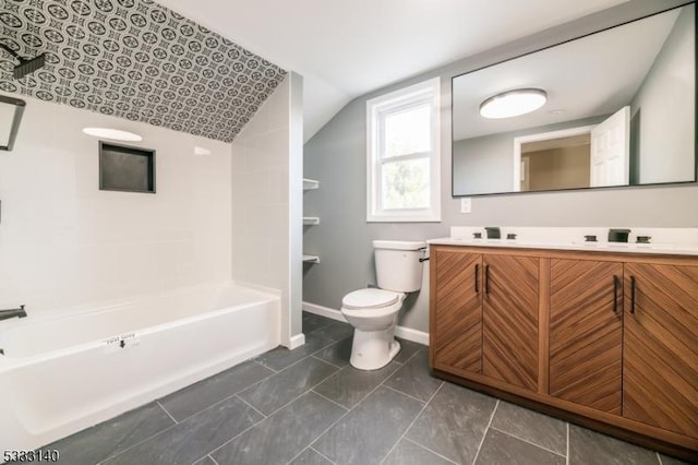 full bathroom with toilet, vanity, lofted ceiling, tile patterned floors, and  shower combination