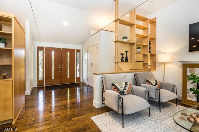 entrance foyer with dark hardwood / wood-style flooring