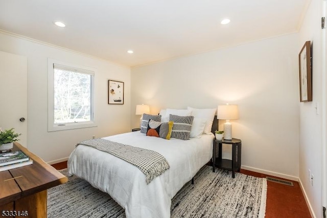 bedroom with crown molding