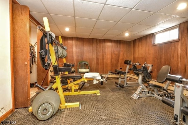 exercise room with wooden walls