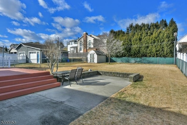 view of patio / terrace with a storage unit and a wooden deck