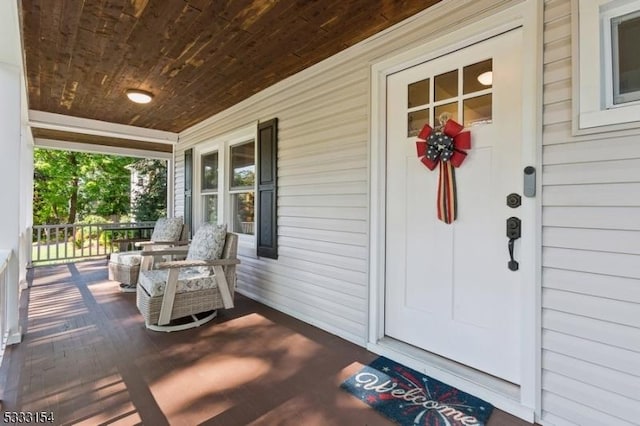 property entrance with a porch