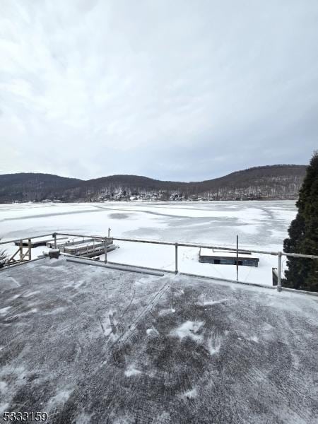 property view of water featuring a mountain view