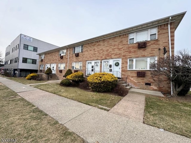 view of front of house with a front yard