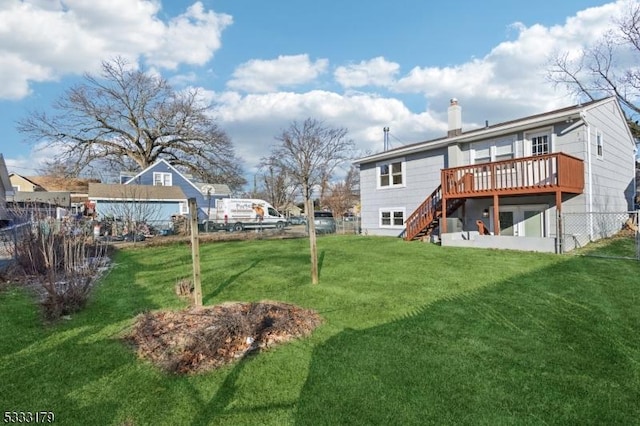 view of yard with a wooden deck