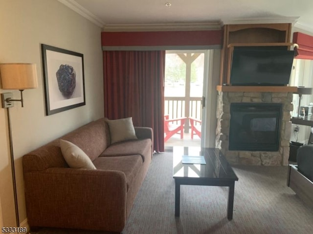 carpeted living room with crown molding and a stone fireplace