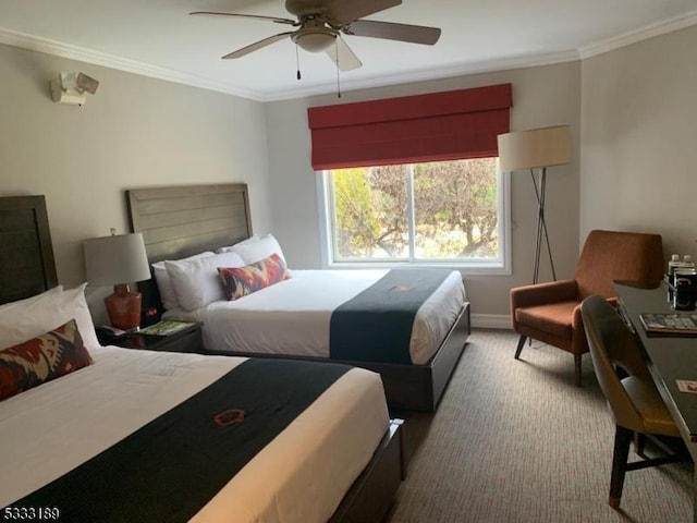 bedroom featuring crown molding, carpet flooring, and ceiling fan