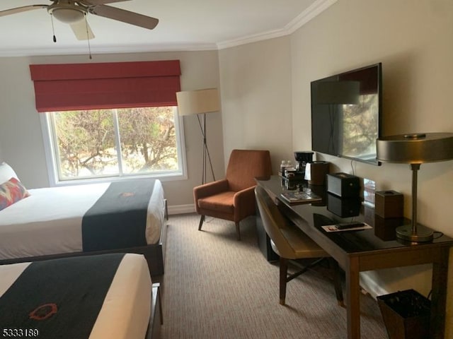 bedroom featuring light carpet, ornamental molding, and ceiling fan